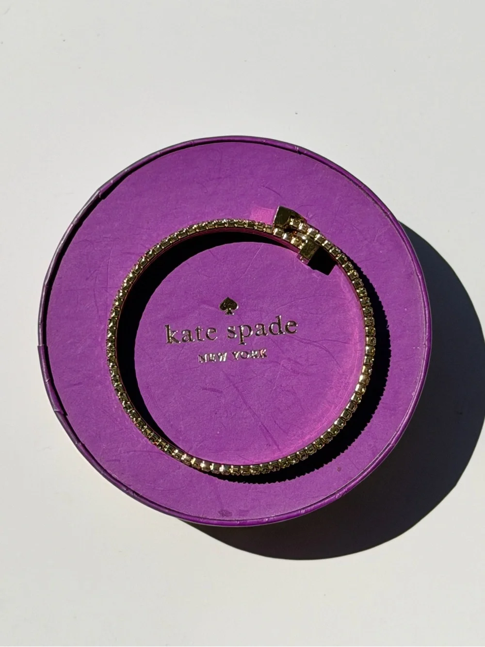 kate spade Gold Crystal Lock Bracelet with Pink Lining